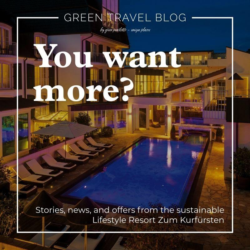 Night shot of a modern resort with an illuminated pool and lounge chairs by the water