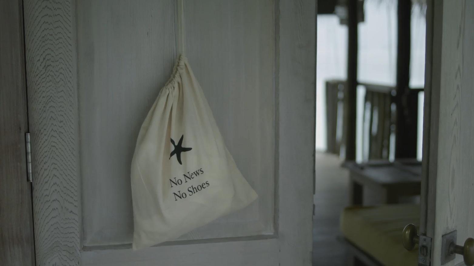 No news no shoes - slogan on a shoe bag on Gili Lankanfushi