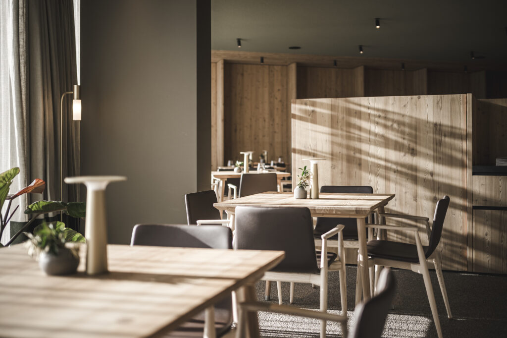 View of the sustainable Prenn° restaurant at the Eco Aparthotel OLM Nature Escape in South Tyrol - breakfast room