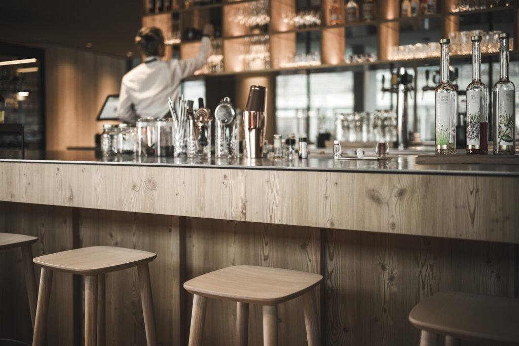 Bar of the sustainable restaurant Prenn° in the Eco Aparthotel OLM Nature Escape in South Tyrol