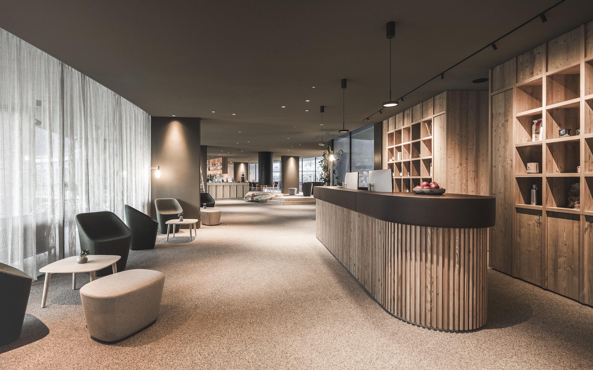 Sustainable and energy self-sufficient aparthotel in South Tyrol: Reception of the OLM Nature Escape