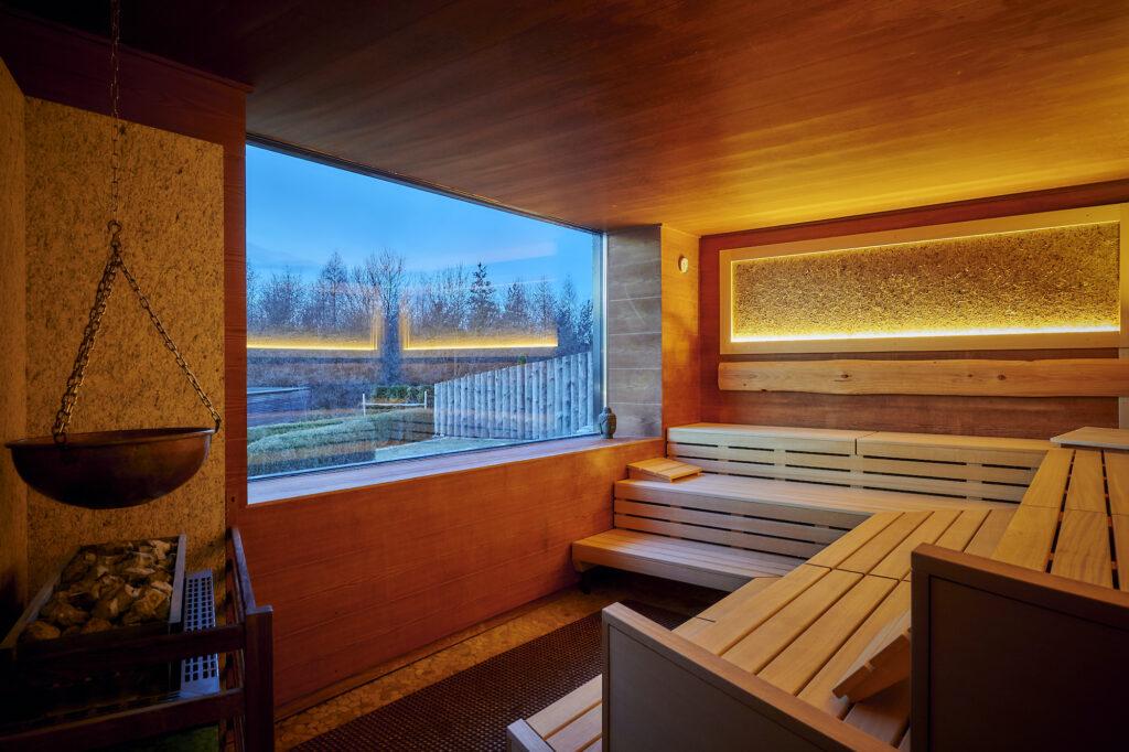 Sauna with panoramic window in the sustainable Hotel Der Birkenhof